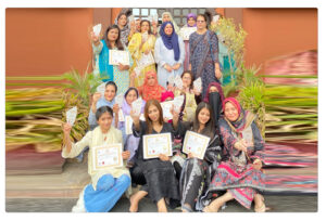 Baking and cooking arts students proudly receiving their certificate awards during a graduation ceremony.
